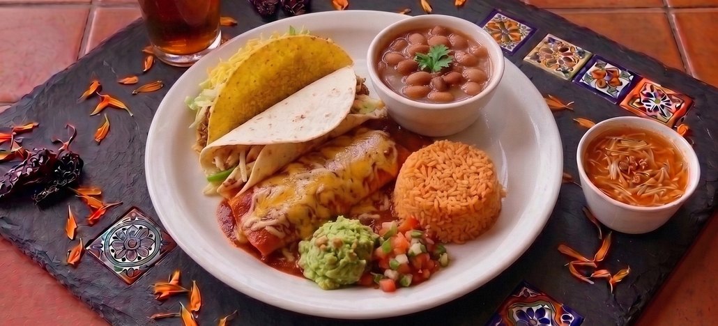 El Jarro plated lunch buffet: red corn cheese enchiladas, crispy beef taco, chicken fajitas, fideo loco, rice, beans, guacamole and pico de gallo